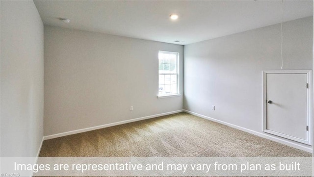 view of carpeted spare room