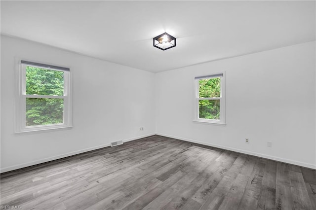 2104 Laura Ln, High Point, NC 27262 - empty room featuring wood finished floors and baseboards