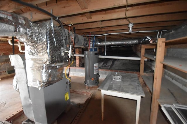 utility room featuring heating unit and water heater