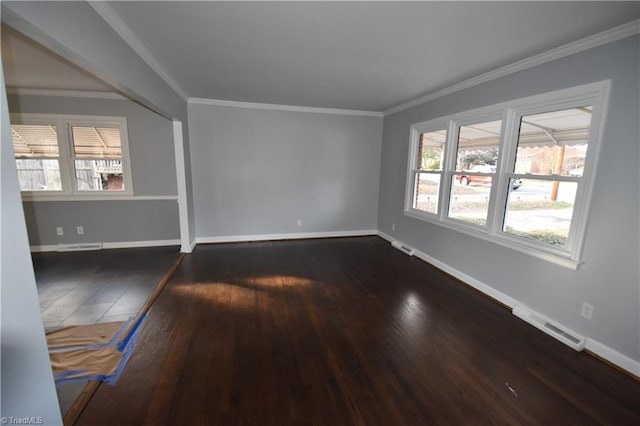 unfurnished room featuring crown molding and dark wood-type flooring