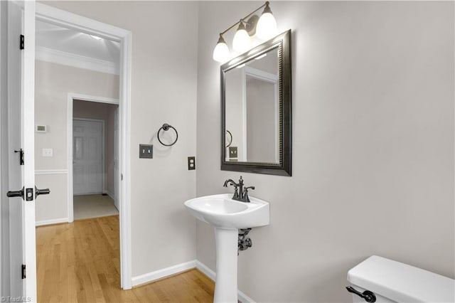 4507 Brandt Ridge Dr, Greensboro, NC 27455 - bathroom with crown molding, baseboards, and wood finished floors