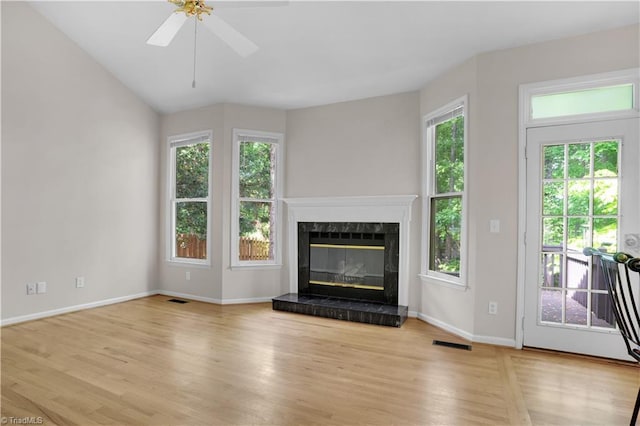 4507 Brandt Ridge Dr, Greensboro, NC 27455 - unfurnished living room featuring a ceiling fan, baseboards, visible vents, and wood finished floors