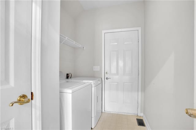 4507 Brandt Ridge Dr, Greensboro, NC 27455 - laundry room with washing machine and clothes dryer, laundry area, visible vents, and light floors