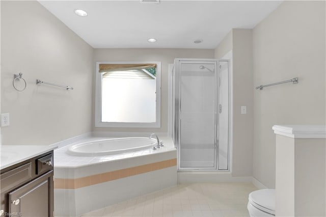 4507 Brandt Ridge Dr, Greensboro, NC 27455 - bathroom featuring vanity, tile patterned floors, a shower stall, and a garden tub