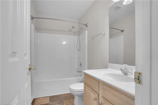 4507 Brandt Ridge Dr, Greensboro, NC 27455 - full bathroom featuring stone finish floor, shower / bathing tub combination, visible vents, vanity, and toilet