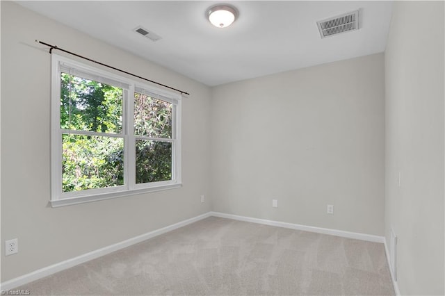 4507 Brandt Ridge Dr, Greensboro, NC 27455 - unfurnished room with light colored carpet, baseboards, and visible vents