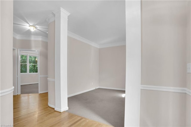 4507 Brandt Ridge Dr, Greensboro, NC 27455 - unfurnished room with baseboards, ornamental molding, ornate columns, and wood finished floors
