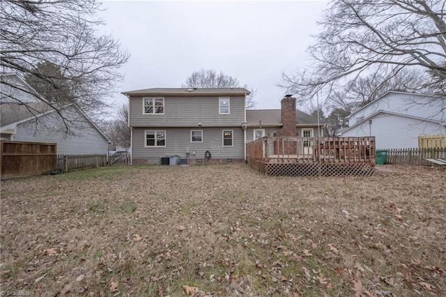 rear view of property with central air condition unit and a deck