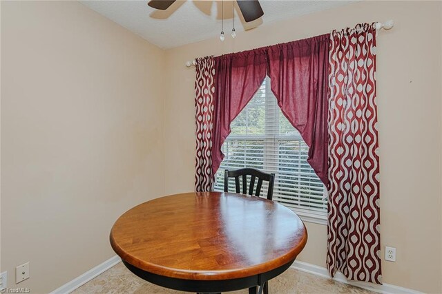 101 Kingston Ln, Graham, NC 27253 - dining space featuring a ceiling fan and baseboards
