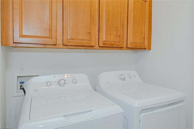101 Kingston Ln, Graham, NC 27253 - laundry room featuring independent washer and dryer and cabinet space