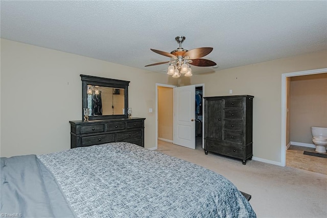 101 Kingston Ln, Graham, NC 27253 - bedroom with light colored carpet, a ceiling fan, and a textured ceiling