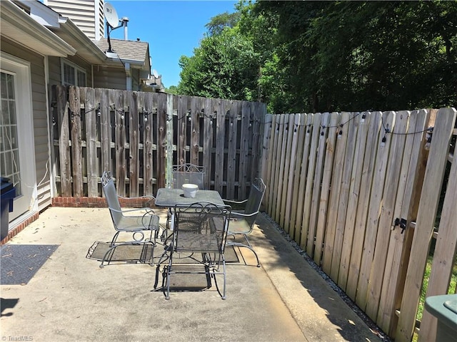 101 Kingston Ln, Graham, NC 27253 - view of patio featuring outdoor dining area