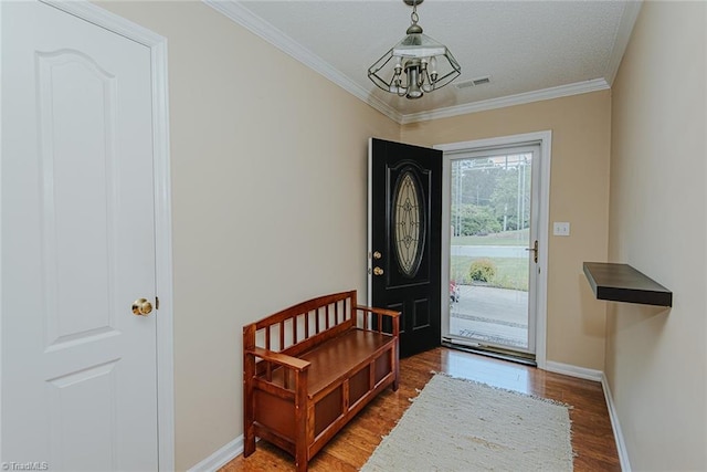 101 Kingston Ln, Graham, NC 27253 - foyer entrance featuring ornamental molding and wood finished floors
