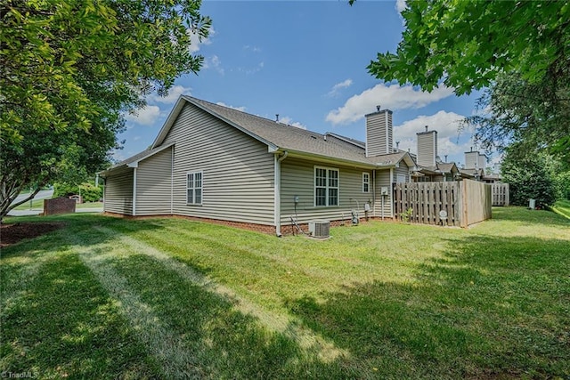 101 Kingston Ln, Graham, NC 27253 - rear view of house featuring a chimney