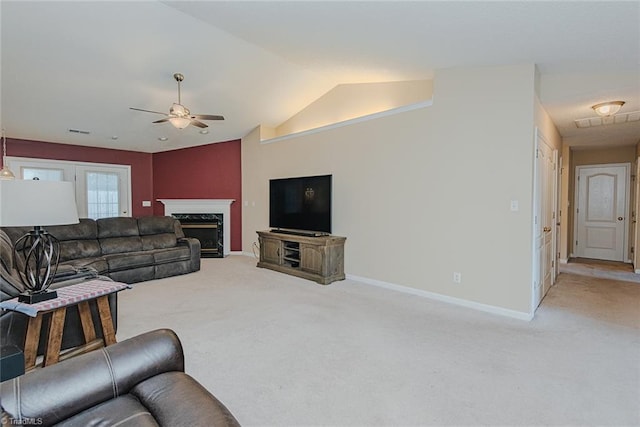 101 Kingston Ln, Graham, NC 27253 - living room featuring ceiling fan, light colored carpet, lofted ceiling, and a high end fireplace
