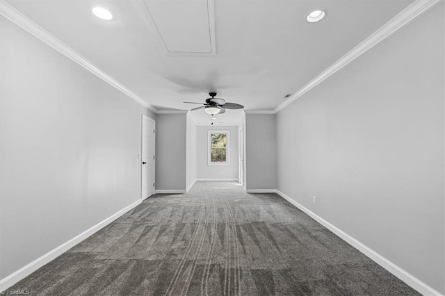 carpeted spare room with baseboards, ceiling fan, recessed lighting, and crown molding