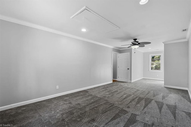 carpeted empty room featuring baseboards, recessed lighting, attic access, and crown molding