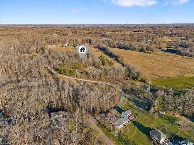 birds eye view of property featuring a rural view