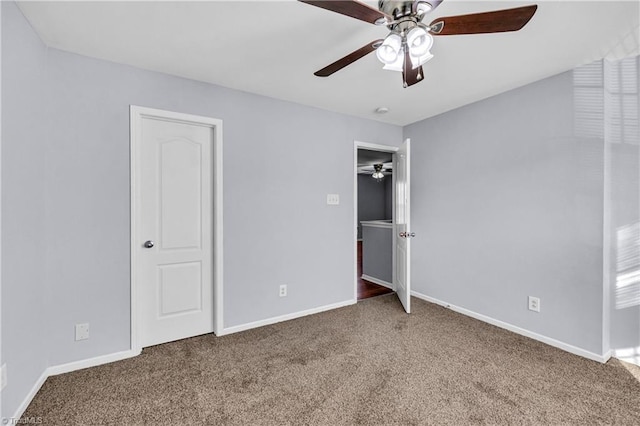 unfurnished bedroom with carpet, baseboards, and ceiling fan