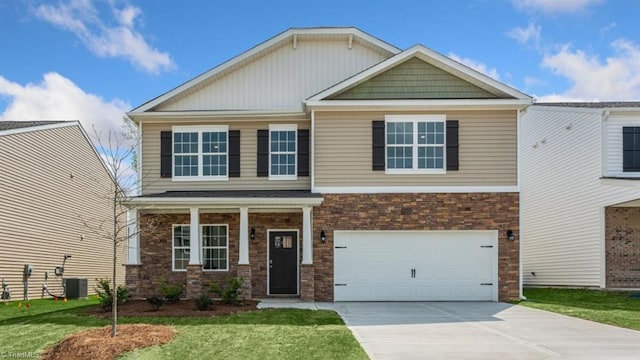3810 Colt Ct, Trinity, NC 27370 - craftsman inspired home featuring concrete driveway, a front lawn, brick siding, and a garage