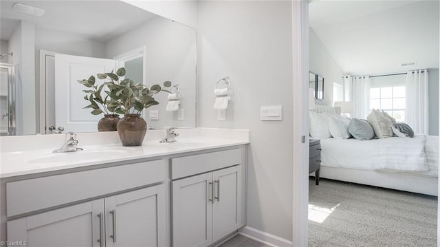 3810 Colt Ct, Trinity, NC 27370 - ensuite bathroom with double vanity, connected bathroom, baseboards, and a sink