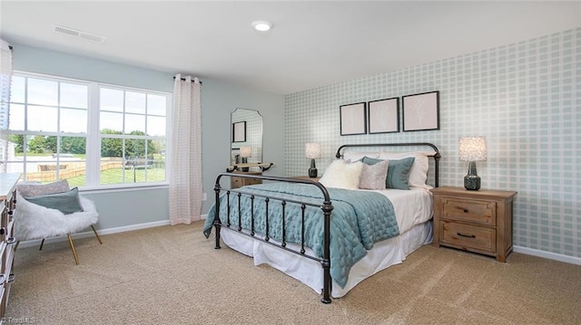 3810 Colt Ct, Trinity, NC 27370 - carpeted bedroom featuring baseboards, visible vents, and wallpapered walls