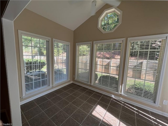 unfurnished sunroom with plenty of natural light and vaulted ceiling