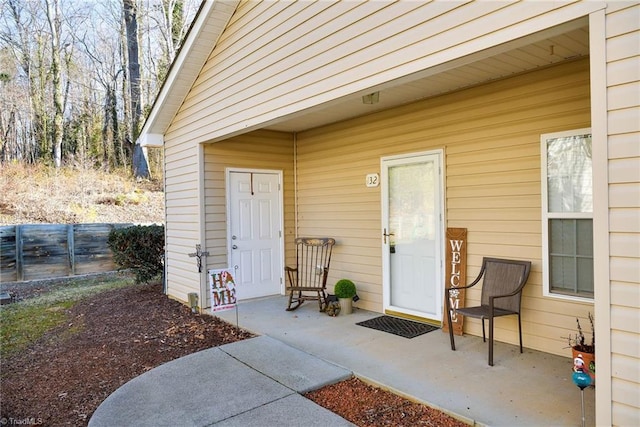 doorway to property featuring a patio