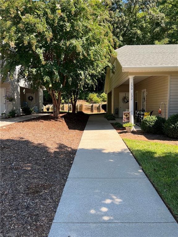 view of yard featuring a carport