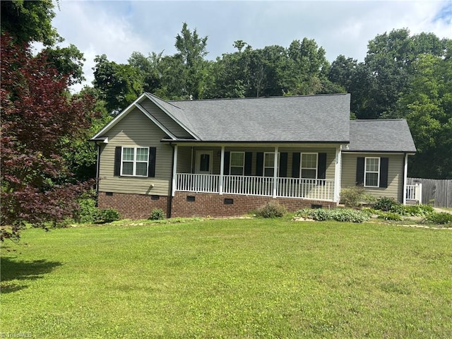 113 Spencer St, Randleman, NC 27317 - view of front facade featuring crawl space, a porch, a front lawn, and a shingled roof