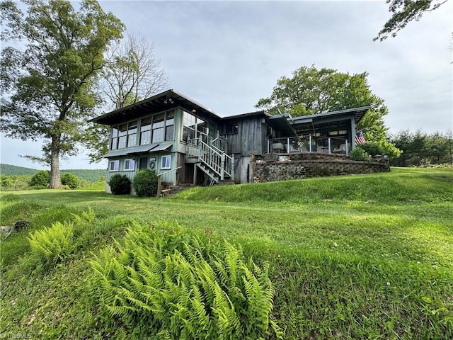 exterior space featuring a front lawn