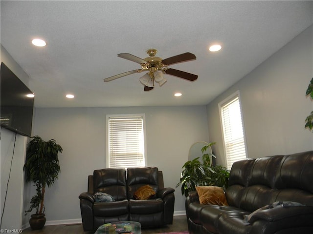 living room featuring ceiling fan