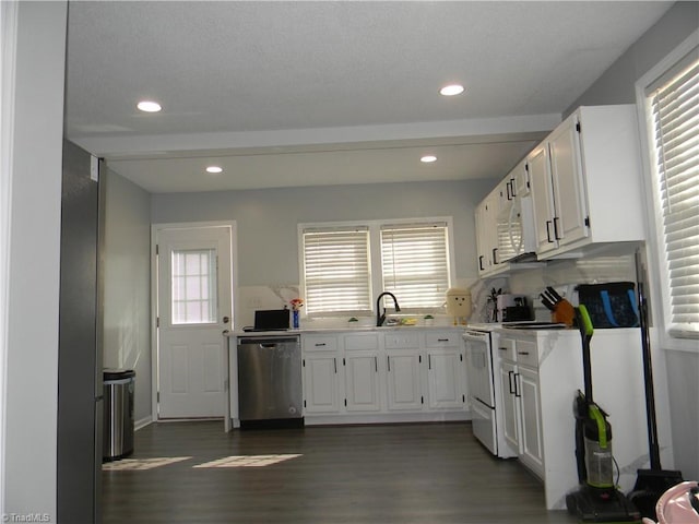 kitchen featuring dark hardwood / wood-style floors, white range with electric stovetop, white cabinetry, sink, and stainless steel dishwasher