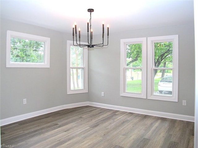812 Midway School Rd, Winston-Salem, NC 27107 - empty room with a chandelier, healthy amount of natural light, and dark wood finished floors
