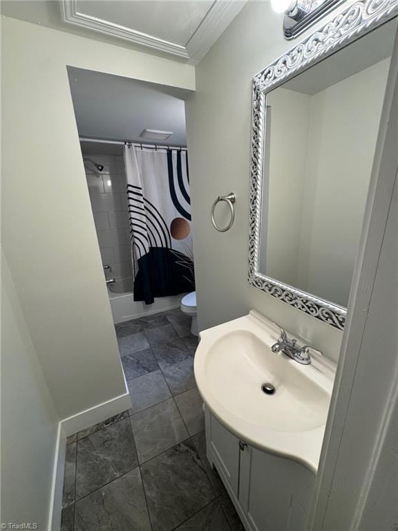 full bathroom featuring vanity, toilet, and shower / tub combo with curtain