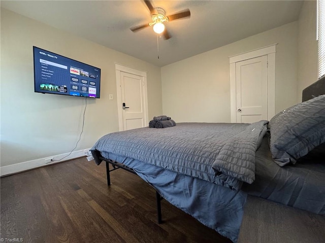 bedroom with wood-type flooring and ceiling fan