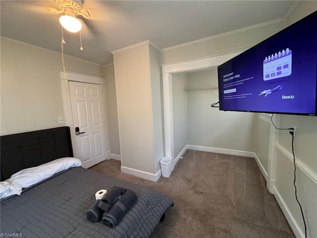 unfurnished bedroom with a closet, carpet flooring, ceiling fan, and crown molding