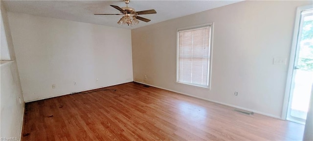 305 Corliss St, Greensboro, NC 27406 - empty room featuring light wood-type flooring and ceiling fan