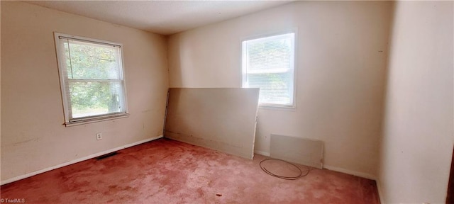 305 Corliss St, Greensboro, NC 27406 - carpeted empty room featuring healthy amount of natural light and baseboards