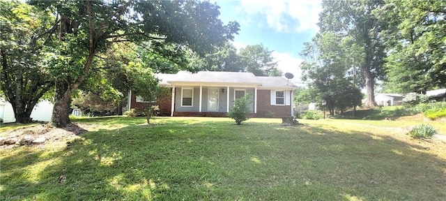 305 Corliss St, Greensboro, NC 27406 - ranch-style home with a front lawn and brick siding