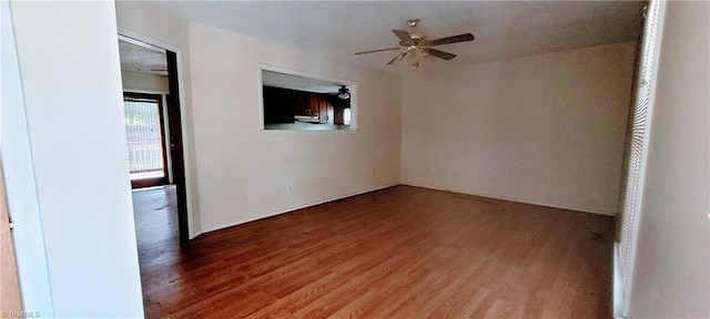 305 Corliss St, Greensboro, NC 27406 - spare room with wood finished floors and a ceiling fan