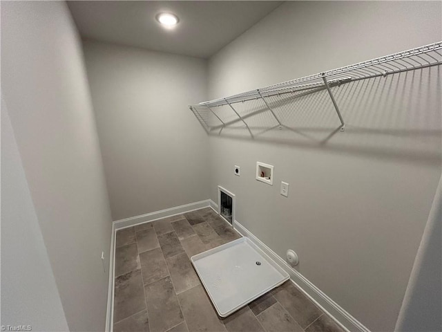 clothes washing area with hookup for a washing machine, hookup for a gas dryer, and hookup for an electric dryer