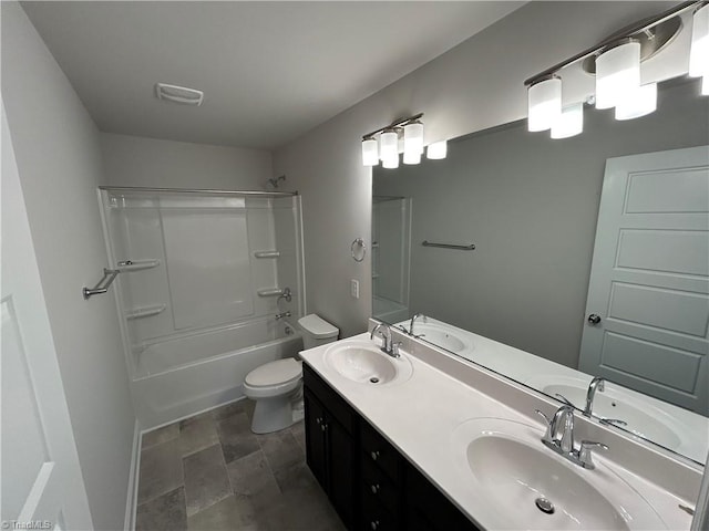 full bathroom with shower / bath combination, vanity, and toilet