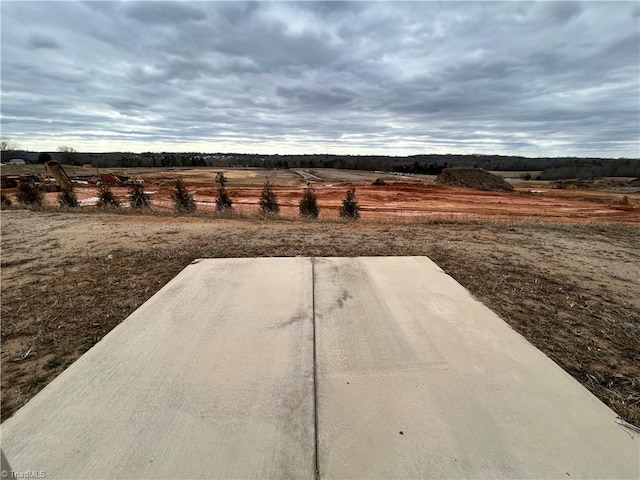 exterior space with a rural view