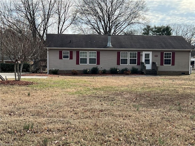 ranch-style house featuring a front lawn