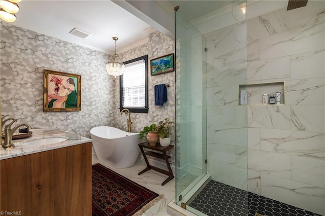 bathroom featuring visible vents, a marble finish shower, a freestanding bath, ornamental molding, and marble finish floor