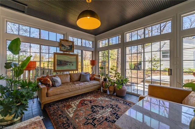 sunroom / solarium with visible vents