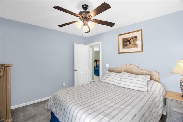 bedroom featuring carpet flooring, a ceiling fan, and baseboards