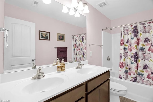 full bath featuring visible vents, a sink, shower / bath combo, and double vanity