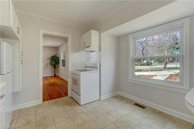 kitchen featuring white appliances, visible vents, under cabinet range hood, white cabinetry, and crown molding